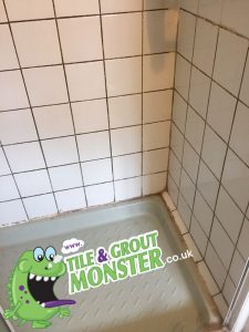 dirty grout in a tiled shower deep cleaned by tile and grout monster belfast